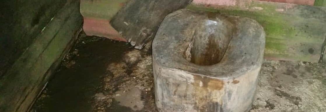 Many outhouses just have a hole in the floor. This toilet is actually constructed out of cement.